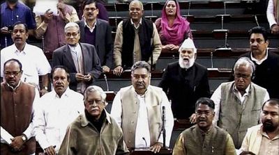 New Delhi: Members in the Lok Sabha during the extended winter session in New Delhi onThursday. PTI Photo / TV GRAB (PTI2_13_2014_000024A)