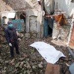 Suror Abdel Karim, a female activist and a nurse from Mosul’s Old City, collects the remaining bodies of the Islamic State militants, in Mosul