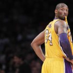 Los Angeles Lakers’ Bryant chews on his jersey during NBA game in Los Angeles